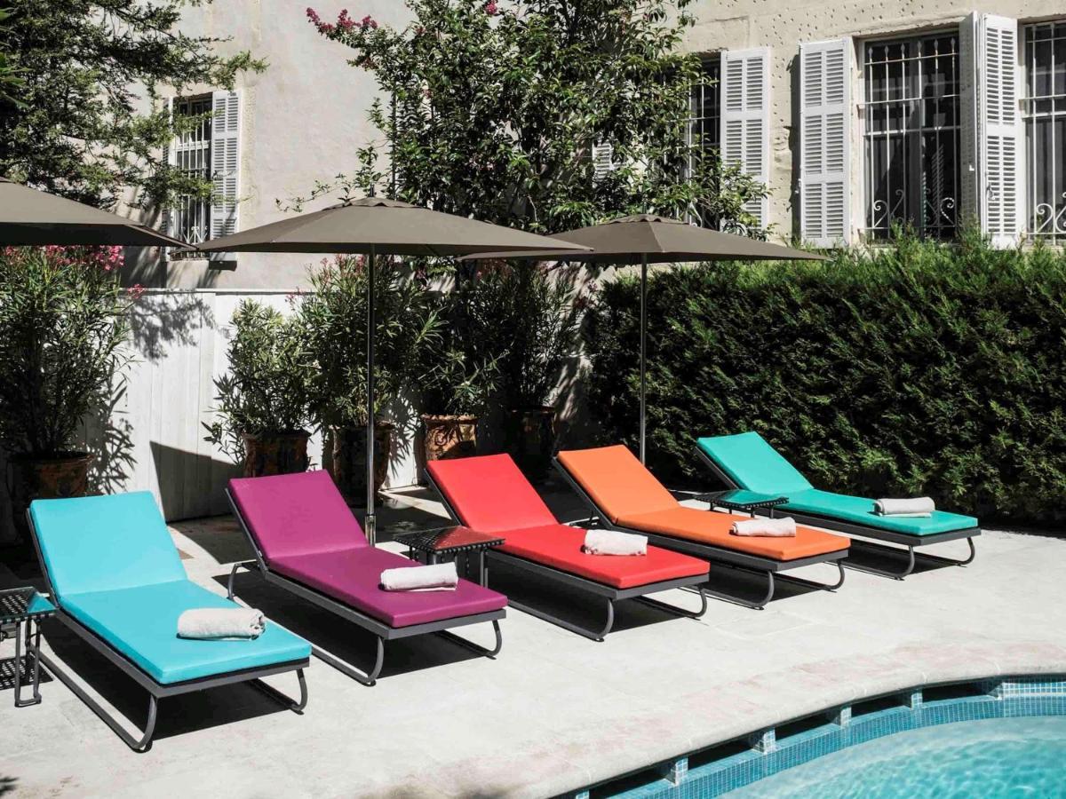 Hôtel&Spa Jules César Arles - MGallery Hotel Collection Esterno foto Chaises longues