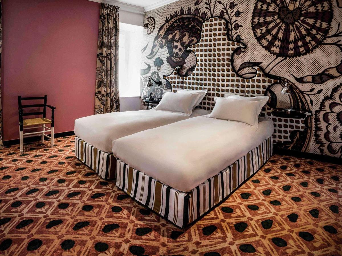 Hôtel&Spa Jules César Arles - MGallery Hotel Collection Esterno foto A room at the hotel
