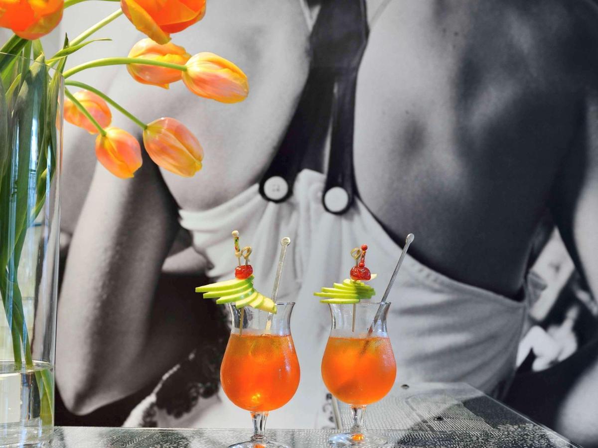Hôtel&Spa Jules César Arles - MGallery Hotel Collection Esterno foto Bellini cocktail